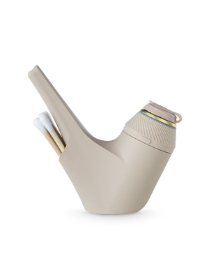 color:desert | Side shot of beige Puffco Proxy travel pipe with beige base and cotton swabs in back compartment
