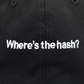 Close up shot of "Where's the hash?" text on black hat with white logo