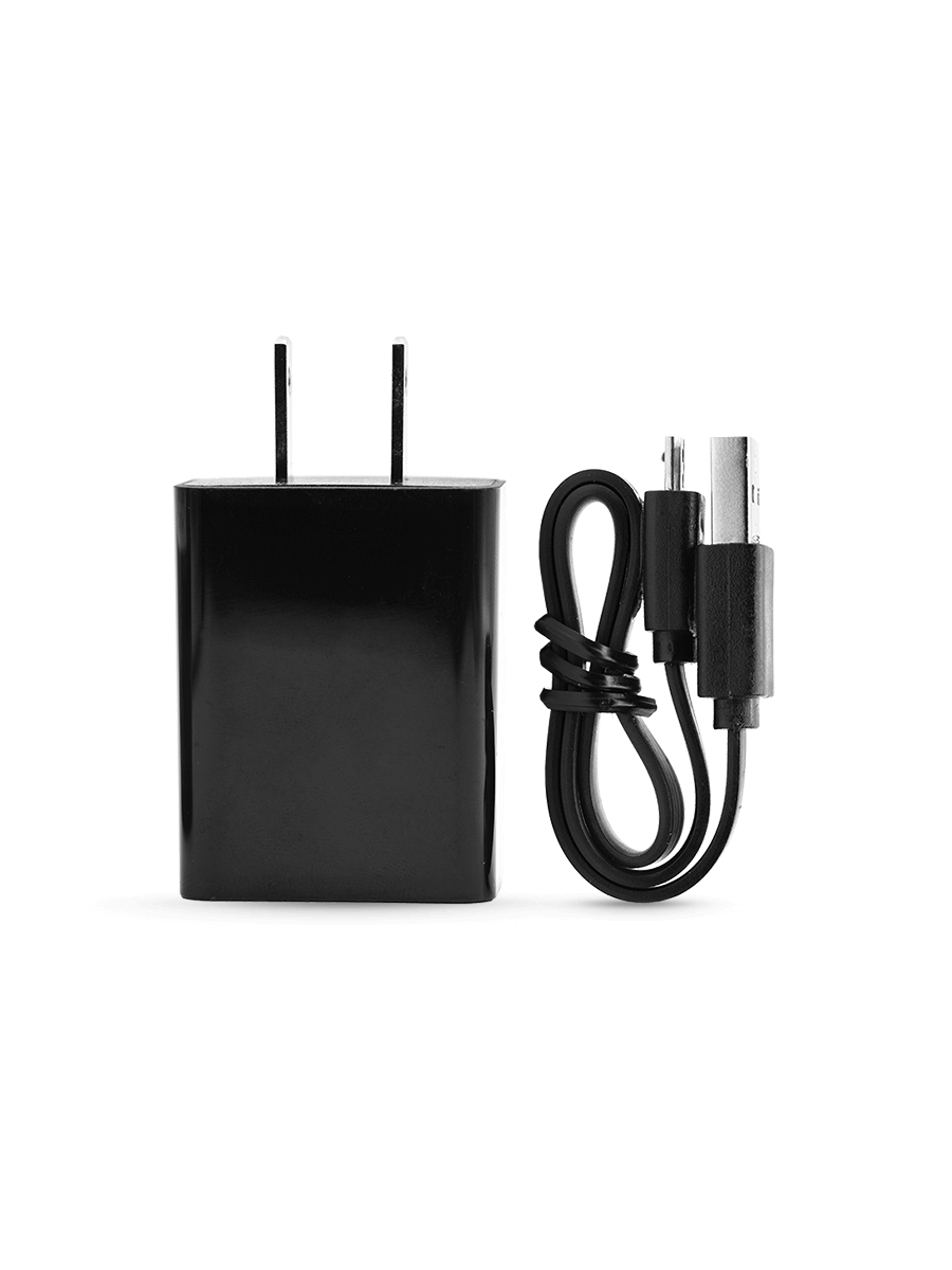Black Puffco Peak charging cable and block against white backdrop