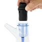 Side shot of Puffco dab water pipe with hand hovering black base over the opening