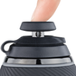 Close up side shot of black Puffco Proxy joystick cap connected to  black base with finger on top